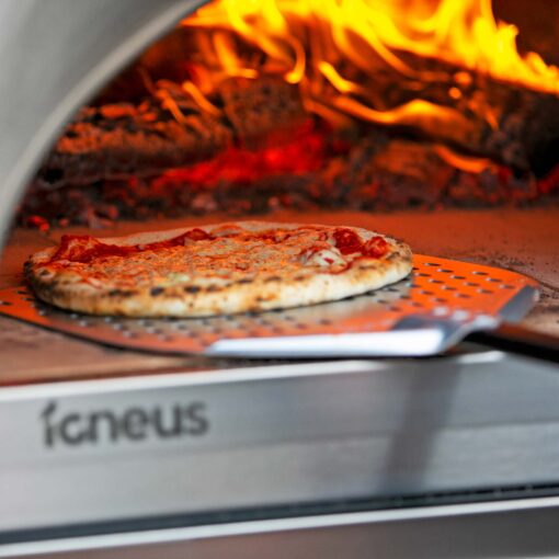 Igneus Pro 750 wood fired pizza oven - outdoor shot - igneus wood fired pizza ovens uk - pizza cooking