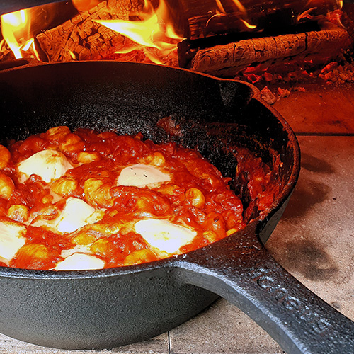 Wood Fired Gnocchi with tomato sauce and Mozzarella